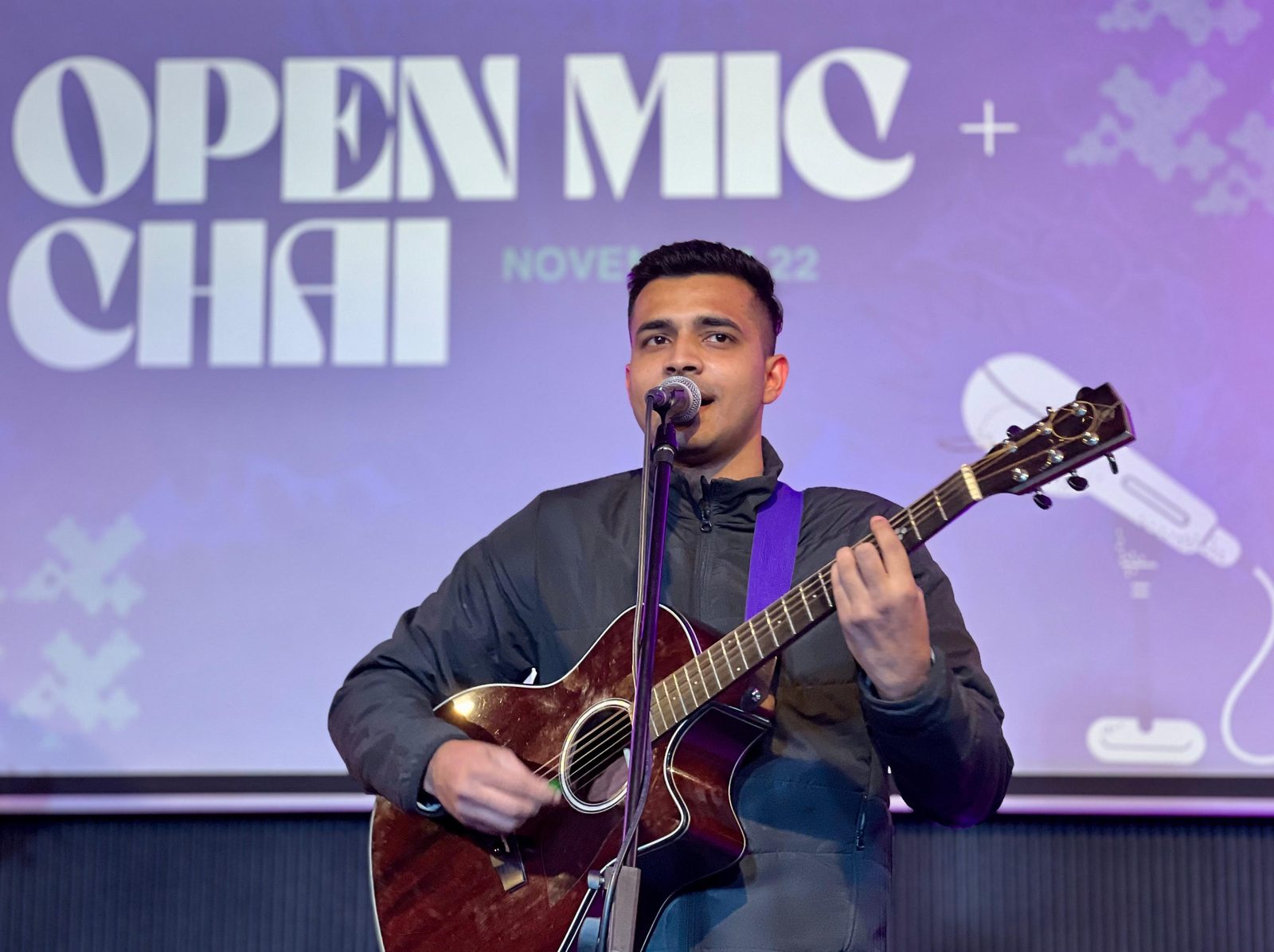 Abhishek performing live at an open-mic showcase